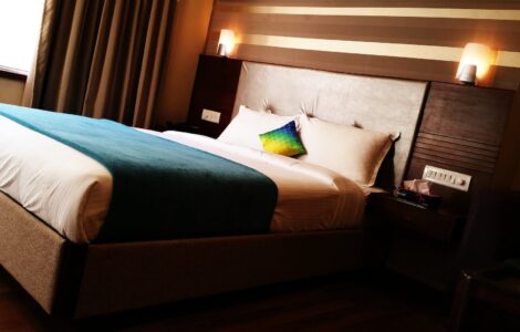 blue blanket on top of bed