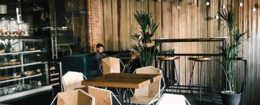 man sitting by the table in cafe