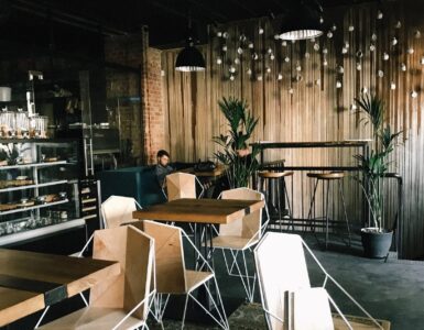 man sitting by the table in cafe