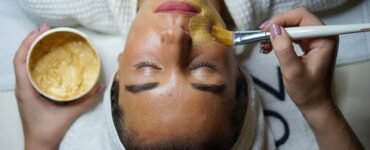 woman doing facial mask