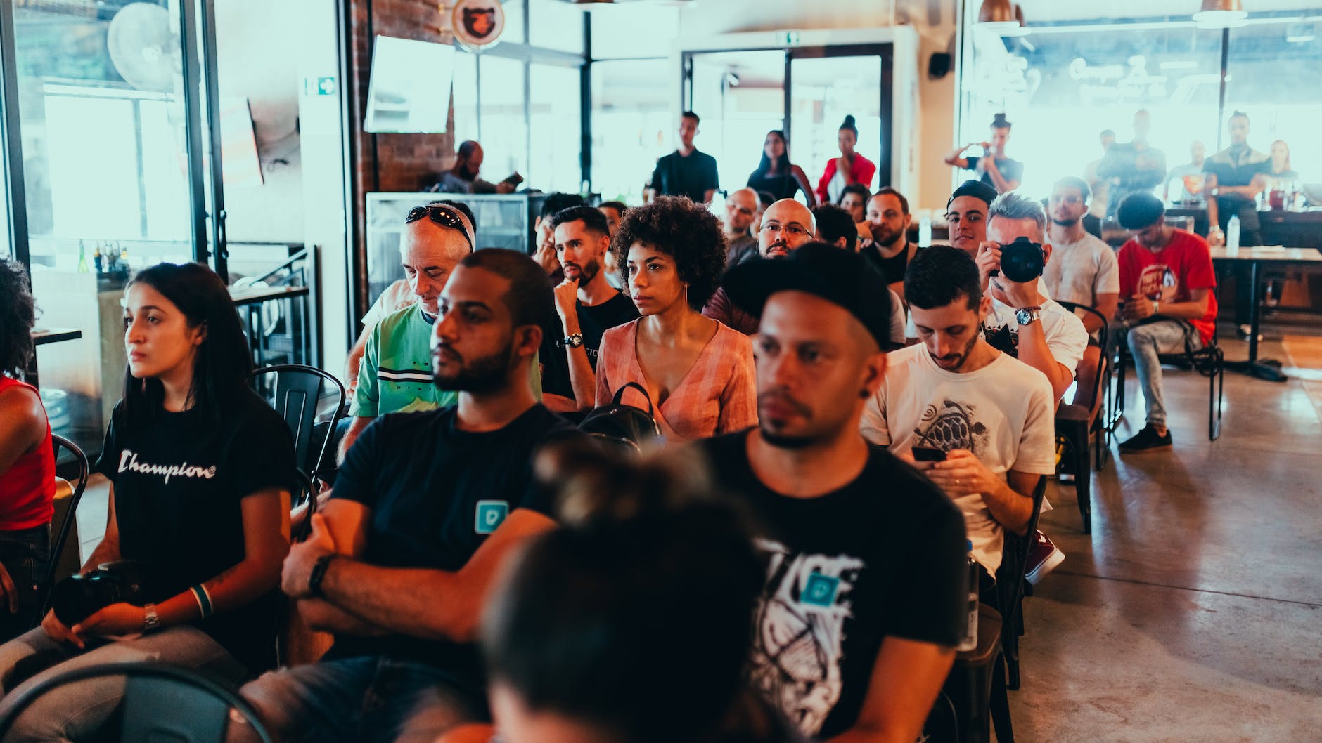 photo of people sitting on chairs