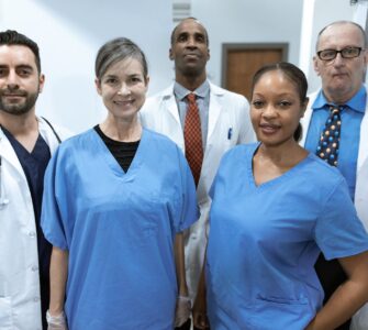 health care professionals smiling at the camera