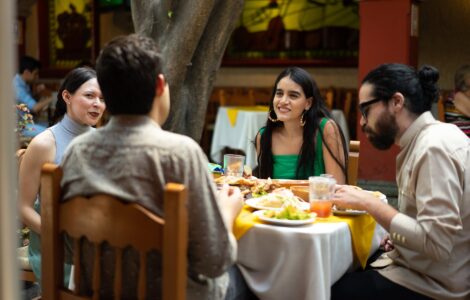 group of friends eating at mexican restaurant