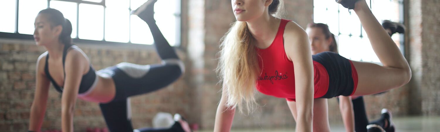 group of woman doing yoga