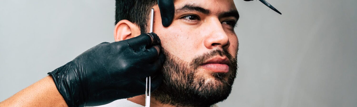 man taking beard shave