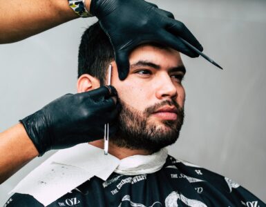 man taking beard shave